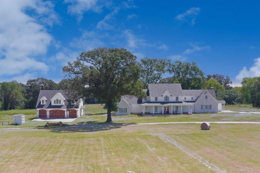 This is a unique chance to own paradise in East Texas!  Just north of Hainesville and a 45 minute drive to Tyler, over 182 acres of highly improved pastureland with a European-inspired modern farmhouse is waiting for your personal touch.  This land is multi-use capable and ready for agriculture and livestock projects or could be used as incredible hunting and recreational grounds. A large lake provides fishing and irrigation for pastures and is serviced through a state-of-the-art pumphouse.  A covered pier and a separate pier on the other side of the lake offers more fishing options. Stop at the exquisite gatekeeper’s cottage. The showroom 4-car garage features custom cabinetry and offers office space and guest quarters upstairs.  The property’s main residence is sheetrocked and partially trimmed and will be luxurious modern farmhouse living at its finest with 3 guest bedrooms and two guest baths upstairs.  Don't miss your chance to own this versatile and stunning property!!