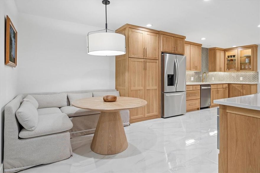 Nestled within the sought-after community of Montego Plaza, this beautifully reimagined 3-bedroom, 2.5-bath townhome offers an exceptional blend of sophistication, comfort, and serene natural surroundings. Perfectly positioned backing to the lush greenbelt, the home provides tranquil views and a sense of privacy rarely found in townhome living. Inside, a thoughtfully designed floor plan unfolds with two spacious living areas and two dining areas, creating an inviting environment for both everyday living and effortless entertaining. The recently renovated kitchen serves as the heart of the home, showcasing elegant quartzite countertops, abundant custom cabinetry, and stainless steel appliances—seamlessly combining beauty with functionality.
The bathrooms have been tastefully updated with a clean, modern aesthetic. The primary bath features a sleek floating-style vanity with dual sinks, elegant quartz countertops, warm wood cabinetry, designer brass fixtures, and a striking textured tile accent wall. The space is both functional and spa-inspired, offering generous storage and a refined, contemporary feel. Expansive windows fill the home with natural light while framing peaceful greenbelt views. Just beyond, the oversized private patio offers a tranquil outdoor retreat—perfect for morning coffee, evening gatherings, or simply enjoying the surrounding greenery. Residents of Montego Plaza enjoy access to resort-style amenities including a community pool, clubhouse, tennis courts, and expansive green spaces ideal for pets or outdoor recreation. Ideally located with convenient access to premier shopping, major highways, and the area’s highly regarded private school corridor, this exceptional residence offers a rare opportunity to enjoy low-maintenance living in a beautifully updated, nature-backed setting.