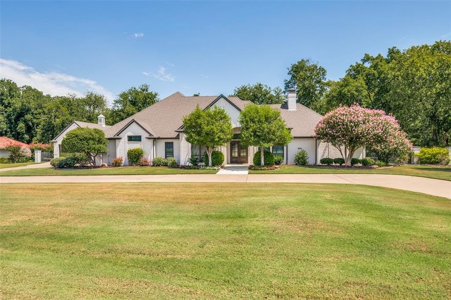 Welcome to your dream home in the heart of Frisco! Located on a quiet cul-de-sac in a peaceful and highly sought-after acreage neighborhood, Custer Creek Farms. You'll enjoy the best of both worlds, with Frisco's amenities, schools, and entertainment options just a stone's throw away while relishing the quiet, spacious feel of country living.  This stunning one-story traditional home is nestled on a sprawling 1.57-acre lot, with a picturesque, crystal-clear spring creek meandering through the back of the treed property -you'll enjoy a serene and peaceful oasis right in your own backyard. Throughout this exceptional home you will find impeccable attention to details with top-notch fittings and fixtures. The home features 2 very spacious living areas, an open concept kitchen, large walk-in closets and recently renovated bathrooms throughout. This property also includes a charming guest house with a separate entrance and its own garage (completely remodeled 2023).