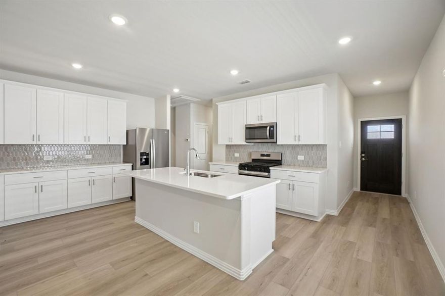 BRAND NEW energy - efficient home Apr 2026! Enjoy family dinners around the kitchen island in the Sequoia's convenient eat-in kitchen. Pebble cabinets with marble-look white granite countertops, beige tone EVP flooring and multi-tone grey carpet. Spend the weekends debating what activity to do in this amenity-filled community, make a splash in the resort-style pool, pick up a game of basketball, or let the kids loose on the playground. With quick access to US 380, residents will enjoy the benefits of a short commute to downtown McKinney, Frisco, or Richardson to enjoy nearby shopping and entertainment. Each of our homes is built with innovative, energy-efficient features designed to help you enjoy more savings, better health, real comfort and peace of mind.