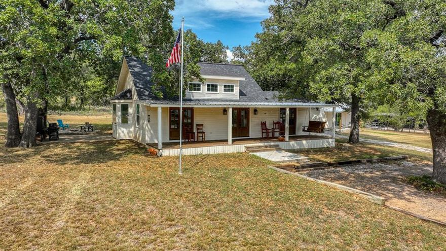 Super Cute modern 2 bedroom 1 bath farmhouse featuring an open living space with a huge quartz kitchen island.  A beautifully updated home along with a newly finished 1 bedroom 1 bath guest house situated on 4.149 acres just three miles north of Downtown Mineral Wells, Texas. This home was thoughtfully renovated down to the studs in 2021. Renovations included a new HVAC system, spray foam insulation, new electrical and plumbing throughout and a new roof in 2024. The guest house, which is 450 square feet, is currently an income producing airbnb bringing in 1600 per month. 
The main home will greet you with three sets of custom French doors, a large front porch, solid Oak floors, 14 foot ceilings, tons of natural light, a huge kitchen with custom White Oak cabinets, quartz countertops and a 36 inch Italian Verona stove.  
Situated amongst native Oak trees and landscape creating lots of privacy, this is a property you don't want to miss.
Contract required to view guest house so tenant isn't disturbed unless showing occurs during vacancy.