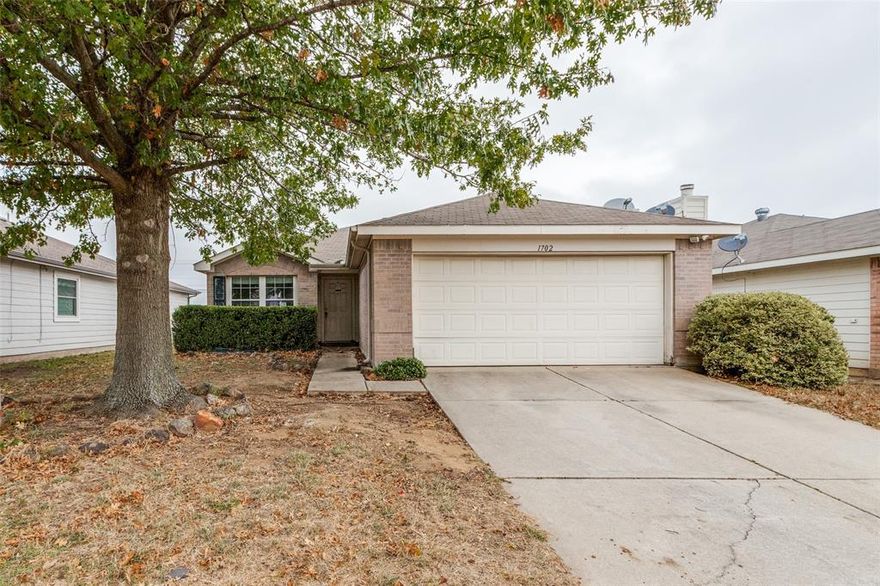 Welcome to your new home located in the family friendly community of Oak Hollow Estates. The area has so much growth and retail nearby. This spacious home has 3 bedrooms with a dining room in the front of the home perfect for entraining. There are three comfortable bedrooms, and full utility room. The heart of this home is living space with a fireplace and seamlessly connects the kitchen and bedrooms. The back yar boost a wood deck space is the perfect place to host friends and family. Don't miss the opportunity to make this home your own, where modern convenience and classic charm meets sustainability! Roof recently replaced. Perfect location close to stores, pools, and parks.