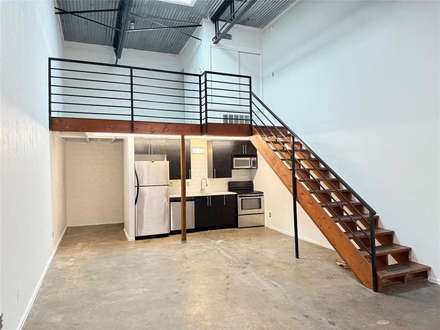 Industrial style loft with concrete flooring and exposed ductwork.  Living, kitchen and bath on the first floor and bedroom upstairs.  Close to arts district, restaurants, entertainment and Baylor.  Bathroom and Kitchen have been remodeled.  NO PETS and No Smoking. Laundry onsite.