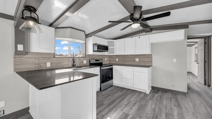 This is one of those homes where you can feel the care that went into it. The owner didn’t cut corners — everything was updated the right way, all the way down to the sewer lines. It’s truly move-in ready, with thoughtful upgrades you don’t always see.

Inside, you’ll find beautiful custom cabinets, granite countertops, and fully remodeled bathrooms that feel fresh, clean, and timeless. Every space feels intentional, polished, and welcoming — the kind of place you’re excited to come home to.

Step outside and the setting really shines. The property sits on a double lot and backs up to a golf course, so there are no backdoor neighbors — just open views and quiet surroundings. Wildlife is part of everyday life here; spotting deer in the yard is not uncommon. The fenced backyard is perfect for kids, pets, or simply enjoying peaceful evenings outdoors.

You get the best of both worlds: the calm, space, and privacy of country living, with shopping, dining, and everyday conveniences just a short drive away. This home is a rare blend of quality, location, and lifestyle — and it shows in every detail.

All information is deemed reliable, but not guaranteed. Buyer to verify all information.