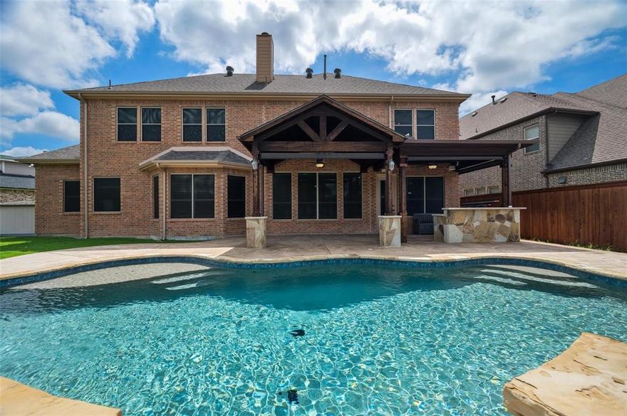 The home has experienced a high level of care, and it shows. 5 bedrooms, 3.5 baths & an unheard of 4 car garage with additional storage. The backyard is over the top, large Covered Patio, pool, spa, fire pit, and open space for games and gatherings with an outdoor kitchen! Updates can be found throughout the house. The Media room includes a massive screen, whole house Audio system, & elevated stadium-style seating. Upstairs you will find a large 3rd living area with built-ins plus 4 additional bedrooms. The area has a grocery store, restaurants, medical care, and so much more.  Why do you want to call Lantana Home? There are many reasons, the HOA has planned events throughout the year from children up to senior programs. A Master planned golf course with club house, hike and bike trails, tennis, basketball, workout centers, and did I hear you say Pickle-Ball courts? Yes! we have those! The great schools with 5 Star rated Razor elementary located a short distance from your front door. One more note on this great property, it has all the benefits of a large community with a small-town feel. Sometimes you choose the house and sometimes the house will choose you, come write the next great chapter of this incredible home.