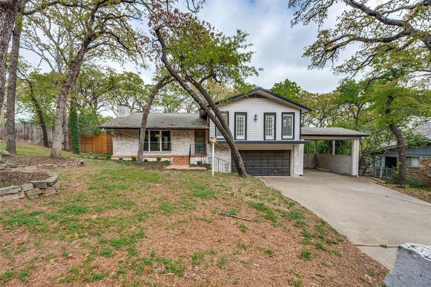 Mid-century modern gem located just minutes from Arlington’s Entertainment District! This 4-bedroom, 3-bath home features a spacious layout with a large kitchen, two primary suites with ensuite baths, and unique architectural charm throughout. Upstairs bedrooms offer private walkout balconies, bringing in natural light and outdoor connection.

Enjoy a huge, tree-filled backyard with mature landscaping and a brand-new deck off the dining area—perfect for relaxing or entertaining. A rare opportunity to own a character-filled home in a prime location!
