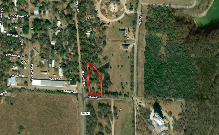 Prime Location! Great corner lot.

Lot 4 of Mariner Cay Estates is now available. Located at the corner of FM 84 - Pappy’s Road and Hanna Drive, this one-acre lot is ready for your new home. It is outside the city limits, near the future Preston Harbor development. City water, electric, phone, and internet are available; septic is needed. The lot offers a pond view and trees for privacy and shade. Restricted to new construction homes only, it is ½ mile from Lake Texoma, near Grandpappy Point Marina, The Point Restaurant, 84 West Restaurant, and HWY 75. Visit today to see if it meets your building needs.