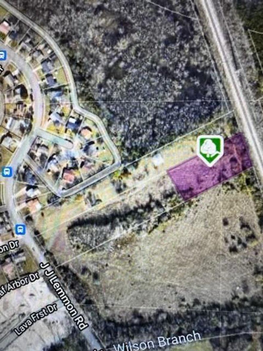 MULTI-PURPOSE 1 ACRE TREED LOT to expand your business or build your dream home. 
The lot is in back of J J Lemmon. Buyer will be responsible for establishing an easement. Private with room to spread out. Close to major highways: 45 and I-20.