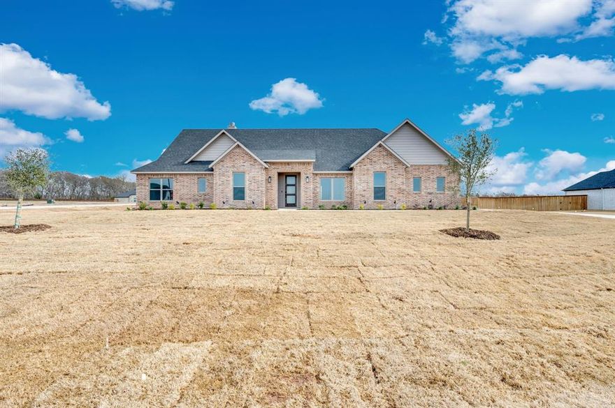 Open House Saturday and Sunday from 9-3! Experience luxury living in this custom one-story AGC home nestled in Waterfall Ranch. Thoughtfully designed with 4 bedrooms, 3 baths, and a dedicated study, this 2,520 sq ft plan features soaring vaulted ceilings, a spacious open-concept living area, and a gourmet kitchen with a oversized island and premium cabinetry. The private primary suite offers a spa-inspired bath and oversized closet. Enjoy a large covered back porch, foam insulation, and an impressive three-car garage. Situated on a quiet street, corner lot with no back neighbors—this is refined Texas living at its best. C