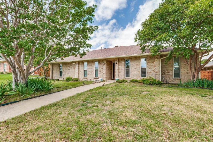This well-maintained, single-story home is thoughtfully upgraded, designed for comfort, efficiency, and everyday living. This property stands out with its installed solar panel system. Inside, the home provides a warm and inviting atmosphere with plush carpeting enhanced by premium extra padding, delivering comfort underfoot. With 3 bedrooms, 2 full baths this home offers generous space and a flexible layout. Two separate living areas are perfect for a home office, media space, or hobby room. The kitchen features granite countertops and an eat-in layout, great for casual dining and everyday living. A gas fireplace anchors the main living space with warmth and character. Out back, enjoy a large covered porch overlooking a spacious yard, ideal for outdoor entertaining, gardening, or simply relaxing.