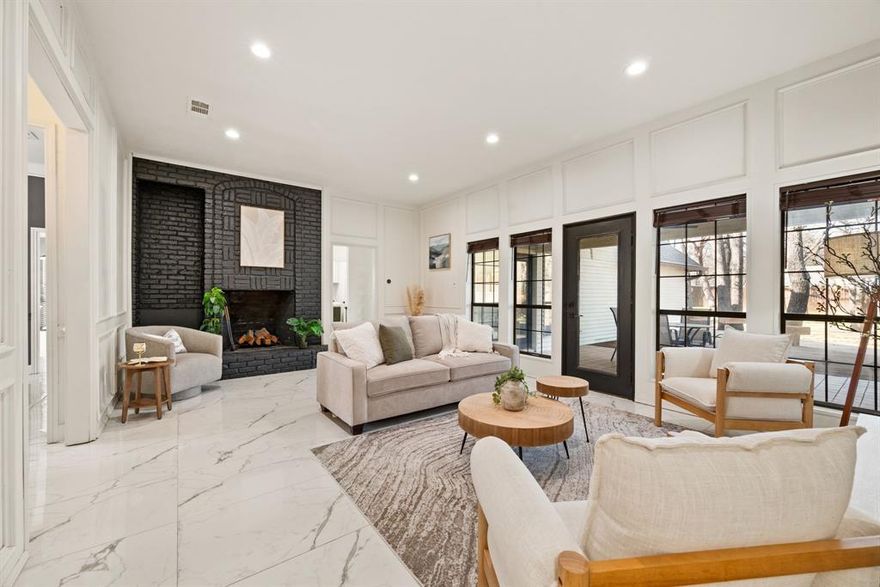 Welcome to this beautifully updated single-story brick home offering endless possibilities with the rare blend of country-style space right in the heart of the city and best of all, NO HOA. Situated on over .55 of an acre, this property is framed by mature trees in both the front and backyard, creating a private and inviting setting. A driveway runs the full length of the lot and is secured by an electric gate, providing ample parking along with a carport and extended space for guests, hobbies, or recreational vehicles. Inside, the home features stylish tile flooring throughout, decorative lighting, and elegant wainscoting that add warmth and character. The eat-in kitchen offers generous counter space and built-in shelving to meet all your storage needs. The primary suite is a relaxing retreat with a spa-like bathroom featuring a soaking tub and a dual waterfall shower designed for a luxurious experience. Step outside to the covered back patio overlooking the expansive backyard, where the possibilities are endless. There is plenty of space to create your dream outdoor oasis, add a pool, RV parking, workshop, guest house, or expand the existing home. Located within the award-winning GCISD, this property combines space, flexibility, and an unbeatable location. Opportunities like this are rare, come see your chance to own a piece of comfort and possibility.