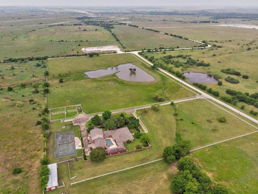 Equestrian Retreat Just 15 Miles from Downtown Fort Worth! 

Experience the perfect blend of luxury living and rural tranquility on this stunning 4 acres estate, located just 1.5 miles from Chisholm Trail Parkway and only minutes from the heart of Fort Worth.

This unique equestrian or cattle-ready property features:

Custom-Built 7,350 Sqft Home – Exquisitely designed with premium finishes and spacious living areas
Resort-Style Pool, Covered Patio & Hot Tub – All enclosed within a brick wall and ornamental fence, forming a private compound over nearly an acre
Water Well Onsite – Reliable water source for home and land