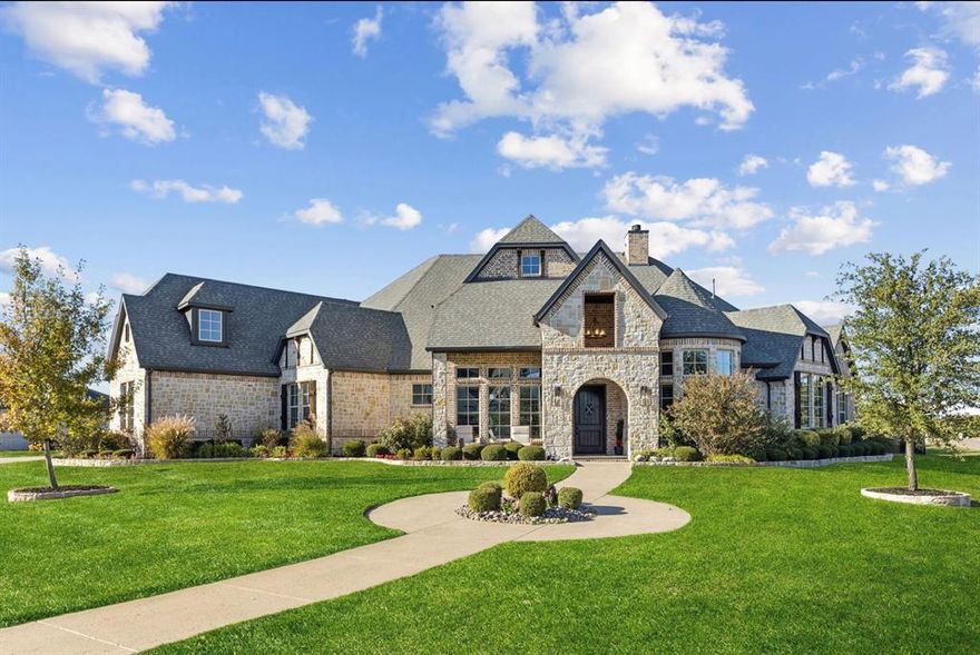 Seller to pay $30,000 in Buyers closing cost rate buy down, moving cost and expenses,
Step into unparalleled luxury at 4241 Tranquility Lane, nestled within the prestigious, gated Christie Farms enclave a private sanctuary of just 56 expansive 1+ acre custom estates in Prosper, TX. This stunning 2017 French Provincial single story gem delivers 5 bedrooms, 5.5 baths, and an impressive 5,392 sq ft of meticulously crafted living space on a full serene acre.Bathed in abundant natural light, the open and airy floor plan is crafted for sophisticated entertaining and relaxed family living. Rich hardwood flooring spans the main areas, complemented by a state of the art surround sound system and automated shades controlled effortlessly through the integrated Control4 smart home technology giving you command of ambiance, security, and convenience from anywhere.At the heart of the home lies an extraordinary chef’s kitchen featuring premium stainless appliances, an oversized island with abundant seating, exquisite stone surfaces, custom cabinetry, and a butler’s pantry for seamless hosting. It flows beautifully into the elegant formal dining room and the grand great room with soaring ceilings and a striking fireplace creating an inviting space for memorable gatherings of any size.The lavish primary suite is a true sanctuary, highlighted by dramatic vaulted ceilings, a resort style bath with dual vanities, deep soaking tub, frameless glass shower, and a massive walk in closet with bespoke organization. Four additional spacious secondary bedrooms, each boasting private baths, ensure comfort and privacy. A versatile game media room awaits movie marathons, game nights, or celebratory events.Signature amenities include a 3-car garage, advanced whole-home water filtration for pristine quality, and vast outdoor grounds with incredible potential—envision your dream pool, covered patio, summer kitchen, or sports area.forever home awaits. 2hr notice required for all showings.