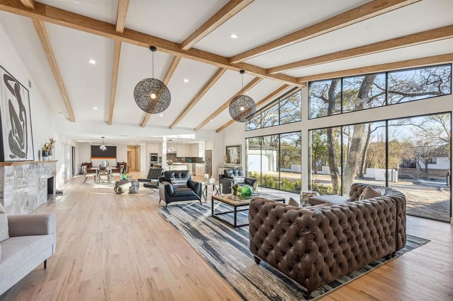 Just Completed Construction on this Preston Hollow Architectural Designed Masterpiece by Adriana Meyer and Jade Custom Homes. Spanning across a Privately fenced Half Acre lot. Completely updated expanding the open concept theme throughout to incorporate lots of natural light.  Soaring living room ceilings,  Stone MCM fireplace, Walls of Glass, White Oak Hardwood floors, Wood doors, Emtek hardware, Museum finished drywall, Custom lighting, Custom Pine Mantle, Wood Beams, and Wired for Sound. Kitchen opens unto the formal dining space, Featuring Custom Cabinets, Quartz Oversized Waterfall Island, SS double wall ovens, Viking cook top, and Vent Hood. Besides the Four Bedrooms also features a Dedicated Office. Large Primary Suite has serene views of the back yard. En suite Bath with Stone oversized shower, Ronbow vanities, and walk in closet.  Home has oversized 2 car garage with extra parking spaces in front.