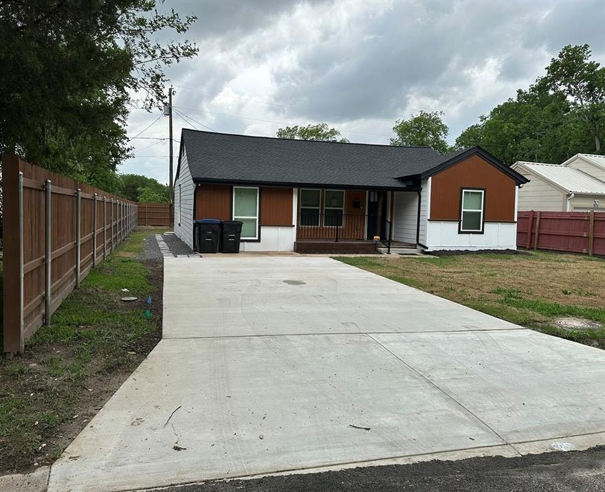 PRICE IMPROVEMENT! Don’t miss this beautifully renovated home in a quiet, established Greenville neighborhood. This move-in ready property features two spacious living areas, an open dining space, and a modern kitchen with custom-built shaker cabinets, a soft-close island, quartz countertops, designer tile, and stainless-steel appliances. Enjoy 2-inch faux-wood blinds throughout, luxury vinyl plank flooring, and a cozy electric fireplace.

The primary suite offers a walk-in shower with designer tile, a modern vanity, stylish lighting, and a walk-in closet. Major system updates include a new HVAC system and ductwork, new electrical panel and full wiring, new plumbing, new windows, Hardi Board siding, gutters, and a metal attic ladder.

Relax outdoors on the covered front porch or new rear deck within a fully fenced backyard featuring an 8-foot wood privacy fence—perfect for gatherings or quiet evenings. Conveniently located near shopping, dining, and entertainment. Seller offering buyer concessions and a one-year home warranty with acceptable offer. Schedule your showing today!