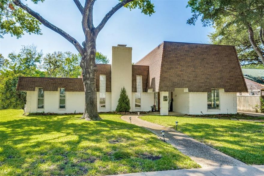 Stunning remodeled 4 bed 3  bath home with sleek contemporary finishes, light and bright open concept, sitting on an oversized lot with mature trees and a lush greenbelt backdrop. Open concept living space with high vaulted ceilings, new recessed lighting throughout, stone fireplace, relaxing view of pool and indoor outdoor sliding glass to covered patio. Backyard paradise with shallow leisure space and dive pool. Family room area with big single pane glass and wet bar with stone accent you'll see across the home. Full remodeled bathroom and a secondary bedroom downstairs. Kitchen boasts a large central island which opens to dining room, and access to breakfast room or study flex space. 2 bedrooms up with Jack n Jill full bath. This home has a REAL master suite 20 by 15 feet, access to rooftop deck, huge walk in closet, and luxurious master bath. Master bath features stand up shower, dual vanity, walk in shower, jetted tub, accent stone, and huge single pane with pool view. Must See!