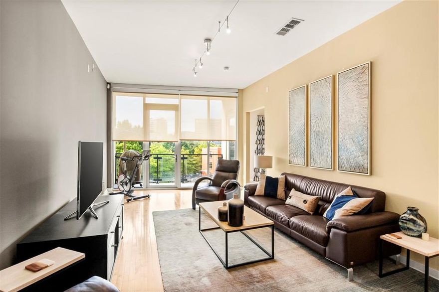 Welcome to this stunning top-floor condo located in the heart of Uptown at Mercer Square. This beautifully appointed home features exceptional modern finishes and offers breathtaking views. The open floor plan is complemented by tall ceilings and large windows that fill the space with natural light. Enjoy outdoor living on your private balcony, and benefit from the convenience of assigned parking.

This condo is designed with luxury in mind, featuring granite countertops, stainless steel appliances, a chic modern backsplash, and an impressive shower. Custom electronic window treatments and elegant wood floors add to the sophisticated ambiance.

Living at Mercer Square means enjoying an unrivaled location with amenities such as gated parking, secure entry, a refreshing pool, and a BBQ area for entertaining. With the vibrant Uptown district right at your doorstep, you can experience the ultimate urban lifestyle. Embrace the opportunity to live, work, and play in Dallas' most walkable neighborhood by choosing Mercer Square as your new home.