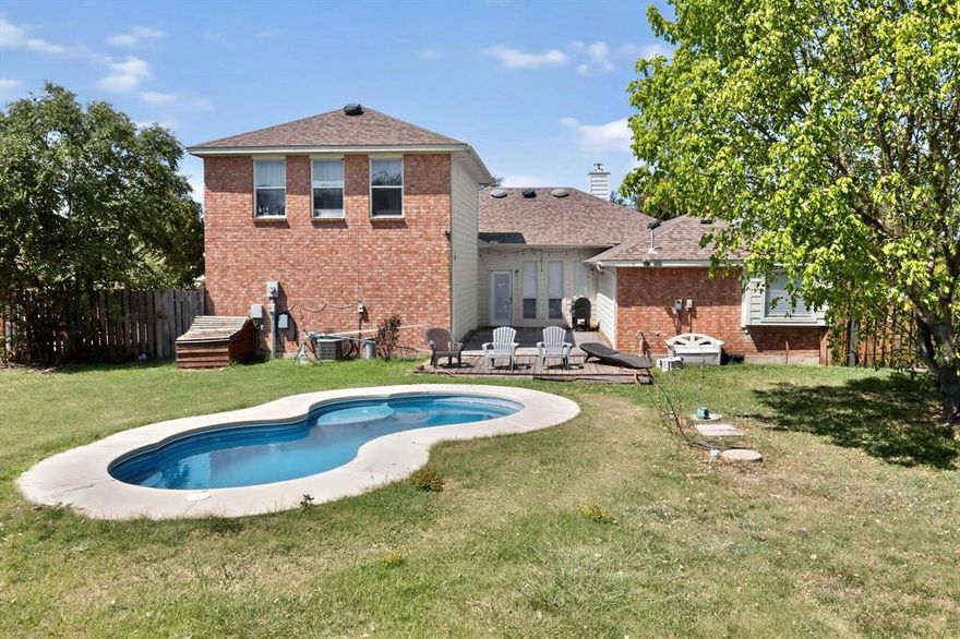 **USDA ELIGIBLE! This home qualifies for 0 DOWN financing through the USDA loan program, offering a fantastic opportunity for buyers looking to maximize affordability.** Escape to serene country living without sacrificing big city conveniences! Located a short drive from Downtown Waxahachie, nestled on a HUGE 0.68-acre lot already complete with a backyard pool & workshop—ready to become your very own private retreat! Low-maintenance landscaping & mature shade trees complement the home’s red brick exterior making for great curb appeal. Charming covered front porch opens to a thoughtfully planned interior featuring MULTIPLE living & dining areas with high ceilings & great natural light throughout. Formal dining room flows into a large kitchen fully equipped with tons of cabinet storage, SS appliances, kitchen island & breakfast bar overlooking the main living room, with the breakfast nook separating kitchen & laundry room. Private primary suite is located off the living room spanning the entire back corner of the home, boasting an ensuite with his & hers vanities, separate shower & large soaking tub, PLUS a big walk-in closet. Remaining bedrooms share a full bath, with closet space in each room. Whether you have a growing family or you’re after a layout with easily convertible flex room, this is a perfect setup. Upstairs den offers even MORE FLEX SPACE where you can create the perfect media room, playroom, private office or space for a home gym… so many options! The main living room features a cozy central fireplace & scenic backyard views, opening to the back patio. An extended deck overlooks the gorgeous in-ground pool & an expansive yard that is bursting with opportunity. Ample space for parking rec vehicles if desired. Large outbuilding with additional square footage can be used as a storage shed or workshop, complete with a covered entry. Don’t miss this highly versatile property located in a quiet, peaceful neighborhood with NO HOA + zoned to Midlothian ISD!