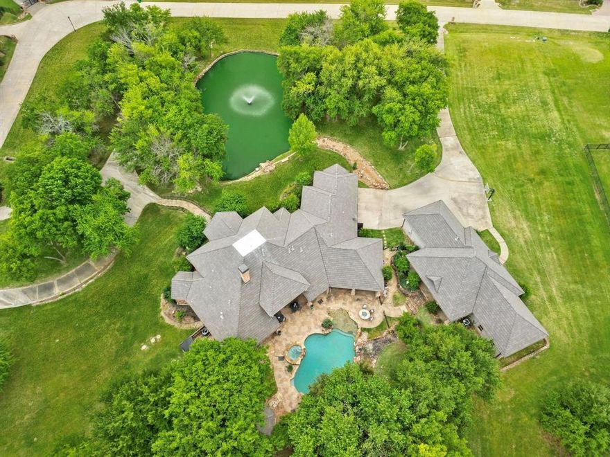 A Private Oasis in Twelve Oaks Estates: Your Yellowstone-Inspired Ranchette!  This one of a kind Luxury Custom and Guest House - Peaceful and Private living in Twelve Oaks, situated on 3.45 acres with a private pond & fountain. Spectacular drive- up, as the main home, is perched over a beautiful private pond with fountain, a park-like setting surrounded by trees. From the full circle driveway, a hitch for your horses and stone steps lead up to the full covered porch and commanding double doors. Multi-Generational w Full Guest House in Twelve Oaks Estates on 3.45 acres. The Best of Both Worlds- living in south Celina and in Prosper ISD. Designed for Entertaining with a 1st Floor MEDIA includes screen, projector -as is- and has tiered stadium seating. The Living has 2 story high tall windows, stacked stone fireplace, flanked with stone shelves and a full bar. Appointed with custom millwork, moldings & polished concrete floors. Primary suite has a fireplace, exercise room. The spa-like Bath has vessel sinks, granite counters, huge shower, & sauna. The 2nd Bedroom down has a full bathroom. Upstairs leads to an amazing  landing & balcony with two split Bedrooms each w ensuite baths,+ a fun Flex-living space. Resort living-lagoon Pool, Spa, Firepit, Octagonal covered Gazebo with a stone mantled fireplace and hearth  Multiple patios, space for Horses to roam, kids to play soccer & fish at your private pond. MECHANICS: DaVinci 50 yr Roof Class IV Rating, Radiant in the attic for energy efficiency - main house.  New Spa Heater installed - 2025, the private Pond- recently upgraded deep well for outdoor irrigation- a huge savings on water. Lot -3.45 acres - dimensions-374 ft x 383 ft, City of Celina Water and trash service for the home.
*Where else can you find a near square interior lot with 3.45 acres, with both a Luxury Home, Separate Guest House, Resort Pool, Spa Gazebo, plus allow Horses?  It's all about the Land Celina & Prosper ISD - Walnut Grove High.