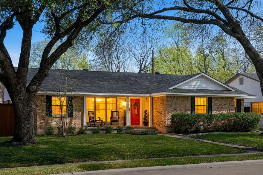 Set in the heart of East Dallas just moments from White Rock Lake and the Dallas Arboretum, this thoughtfully updated 3-bedroom, 2.5-bath home blends timeless character with modern ease. Fresh interior and exterior paint create a refined first impression, while the flexible layout offers multiple living and dining spaces designed for both everyday living and effortless entertaining. The main living area is anchored by exposed wood beams, a classic brick fireplace, and an abundance of natural light. The kitchen is well-appointed with granite countertops, stainless steel appliances, a gas range, and a bright breakfast area that opens seamlessly to the living space. The primary suite offers a quiet retreat with an en-suite bath and separate vanity area, while generously sized secondary bedrooms provide comfort and versatility. Outdoors, a spacious, tree-lined lot features a built-in natural gas grill and sprinkler system for easy maintenance. A detached two-car garage with alley access adds function and flexibility, complete with a workbench and additional space for storage or a home gym. A rare opportunity to own a beautifully maintained home in one of East Dallas’ most desirable settings.