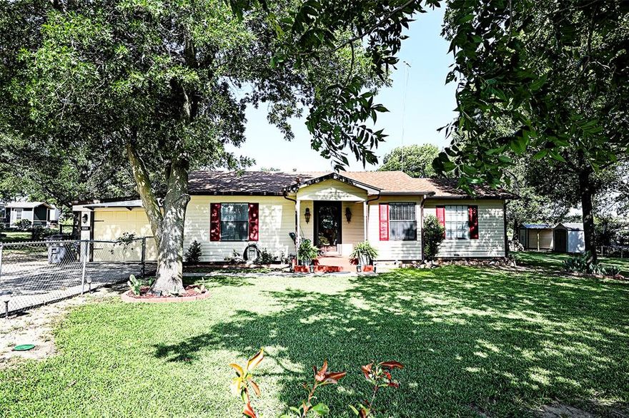 Escape the city and enjoy serene living just beyond the city limits in this beautifully maintained home, offering space, privacy, and numerous thoughtful upgrades. Set on a generous lot with mature trees and fresh landscaping, this property perfectly blends rural charm with modern convenience. Recent updates include a new single-car garage with durable hardie board siding, a convenient access door from the laundry room, and an addition of an upgraded well house with a new water softener, pump, filter, pressure tank, and all-new plumbing in the well house. Outside, you'll find a carport with electric, as well as a cozy she shed with electric, water, and gas connections perfect for hobbies, relaxation, or creative space. Enjoy cozy evenings by the gas fireplace and low-maintenance living with features like gutters with leaf guards. This move-in-ready home is perfect for anyone seeking comfort, privacy, and lasting value in a peaceful setting.