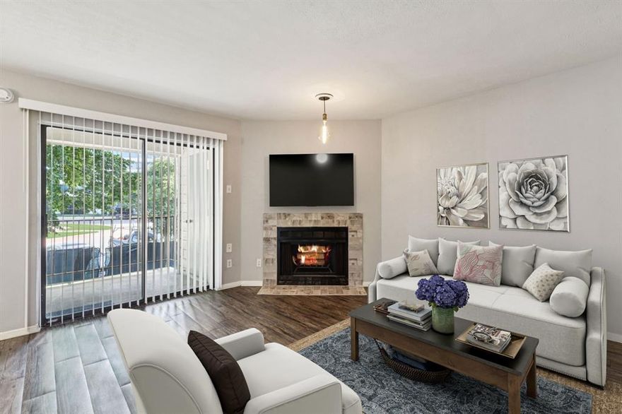 Welcome to 2505 Wedglea Drive, Unit #209—an updated and stylish second-floor condo just steps from Stevens Park Golf Course and Coombs Creek Trail. This modern residence offers a sleek open-concept layout and the convenience of city living with direct access to nature, vibrant nearby neighborhoods, and exceptional community amenities. Inside, you’ll find a bright and spacious living area anchored by updated laminate wood flooring and a seamless flow into the dining and kitchen areas. The kitchen is outfitted with granite countertops, updated fixtures, and matching stainless steel Whirlpool appliances, including a refrigerator that conveys with the sale. Two well-sized bedrooms provide generous closet space, and both bathrooms have been refreshed with contemporary finishes. A full-size laundry closet with washer-dryer hookups and a private exterior storage closet add everyday convenience. Relax or entertain on the large outdoor patio, or take advantage of two sparkling community pools located just steps away. With a new HVAC system installed in 2020 and a new roof added in 2023, this home combines peace of mind with low-maintenance living. A reserved covered parking space is included, with additional guest parking available throughout the community. The location is ideal—around the corner from the brand-new Sprouts grocery store, and minutes from the shopping, dining, and cultural hotspots of Bishop Arts. Outdoor enthusiasts will enjoy immediate access to the Coombs Creek Trail through a gated path on the property, as well as a tunnel under Hampton Road connecting to Kessler Park. The HOA covers water, sewer, trash, exterior maintenance, and landscaping—offering true lock-and-leave convenience in a desirable and connected setting. This condo blends modern upgrades, smart amenities, and a premier location—perfect for those seeking both comfort and accessibility. Mortgage savings may be available for buyers of this listing