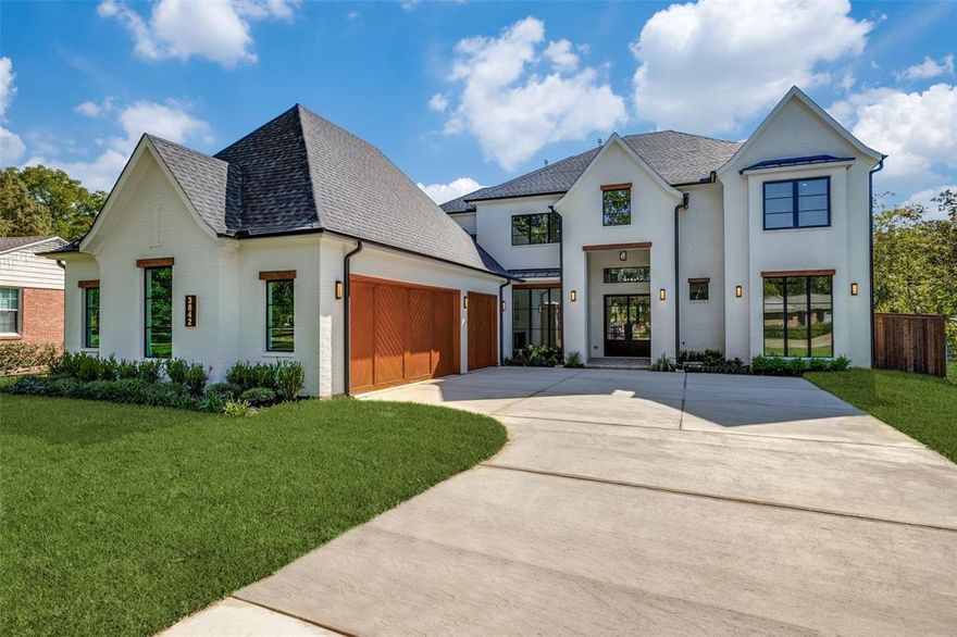 Experience luxury in this stunning new construction home on a 0.32-acre lot in the coveted Midway Hollow neighborhood. The striking facade is enhanced by a three-car garage featuring cedar wood doors.

From the grand porch, you are welcomed into a beautiful foyer. Flanking the foyer, the formal dining room captivates with its soaring ceilings. The open-concept design connects the living, kitchen, and breakfast areas, overlooking a serene backyard through premium Sierra Pacific windows and sliding aluminum doors. The living room boasts striking ceiling beams and beautiful hardwood floors. The gourmet kitchen is centered around a 10-foot waterfall quartz island, a quartz backsplash, and top-tier KitchenAid appliances, including a built-in fridge and a 48-inch gas range. 
The main floor hosts a tranquil primary suite. Its spa-inspired bathroom is appointed with dual sinks, a freestanding tub, dedicated makeup vanity, and a custom walk-in closet. An additional ensuite bedroom, private home office, and a stylish powder bath complete the first level. Ascend to the second floor to a spacious game room, media room, three generously sized bedrooms, and three full baths.

The commitment to quality is evident in foundational elements, including foam insulation in the master suite and porch, three Carrier HVAC systems, two Navien tankless water heaters, a foundation drip system, a smart Rachio irrigation system, and stone retaining wall. Hardwood floors flow throughout the home, except for the media room, to enhance acoustics. The downstairs baths, bar, and fireplace areas are elevated by designer tiles from Porcelanosa, Tile Shop, and Mirrella. Custom white oak cabinetry is featured in the kitchen, master bath, bar, secondary downstairs bath, and mudroom.
The outdoor area offers a covered patio with a kitchen and sink. This home exemplifies exceptional craftsmanship, providing a luxurious lifestyle in one of Dallas’ most desirable neighborhoods. Agent also home builder.