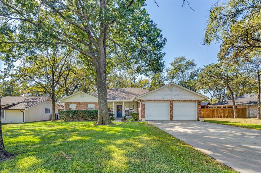 Recently updated and move-in ready, this home has a great layout and a location that’s hard to beat. The front porch is the perfect spot for coffee or winding down at the end of the day.

Inside, the open living, kitchen, and dining areas all connect easily, making the space feel comfortable and functional. The kitchen offers plenty of counter space, a large island with seating, and room to spread out. The dining area features a built-in desk and a fireplace, adding both convenience and character. Just off the kitchen, the screened patio gives you a place to enjoy the outdoors without the bugs.

The primary suite is spacious enough for a sitting area and includes a private bath with dual sinks, soaking tub, separate shower, and a walk-in closet. Two additional bedrooms work well for guests, an office, or whatever you need.

The oversized utility room is a standout feature, with space for an extra fridge or freezer, plus room for storage, hobbies, or a workspace.

Out back, you’ll find a private yard with mature trees and a large workshop or storage building.

Located on the west side of Lake Kiowa, you’re close to the lodge, pro shop, and west beach. Enjoy everything the community offers, including the lake, golf course, and more.  Check out the new par 3, 9 hole course and new pickleball courts expected to be completed soon!  Unlimited golfing is included in POA dues.  The private lake is only accessible by property owners, meaning very little lake traffic.  Lake Kiowa is a lifestyle like no other!