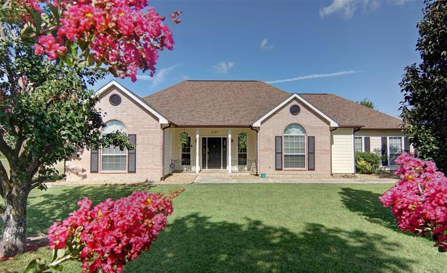 Enjoy peaceful country living with modern conveniences just minutes away! Nestled on a beautiful 5-acre parcel, this private retreat offers a quiet paradise surrounded by natural beauty and thoughtful landscaping, including crape myrtles and gravel flower beds. The highlight of the backyard is the stunning Gunite swimming pool, perfect for relaxing or entertaining on warm Texas days. A large, shaded back porch provides the ideal spot for cookouts, gatherings with friends and family, or simply unwinding with a view of your tranquil surroundings. Inside, the home features a spacious and welcoming layout, starting with a formal dining area just off the kitchen. The kitchen is open to the main living space and also includes a bright and cozy breakfast nook, making it the heart of the home. The main living area is cheerful and generously sized, comfortably accommodating even larger furnishings. Need extra space? A second living room, offers a huge bonus area that’s perfect for hosting, a game room, or even a home theater setup. With four well-proportioned bedrooms, there’s room for everyone, and the large master suite is a true retreat. Just off the master, you’ll find a sunroom with beautiful backyard views, ideal for a home office, gym, craft space, or private sitting room…the possibilities are endless. Additional features include a carport with a storage area perfect for lawn equipment or outdoor gear. Located just minutes from Interstate 30, this property offers quick access to Sulphur Springs for shopping, dining, and entertainment in its charming downtown. And with Dallas within easy reach, you’ll enjoy the best of both rural serenity and city convenience. Don’t miss your opportunity to own this slice of country paradise that truly offers it all—space, comfort, privacy, and accessibility.