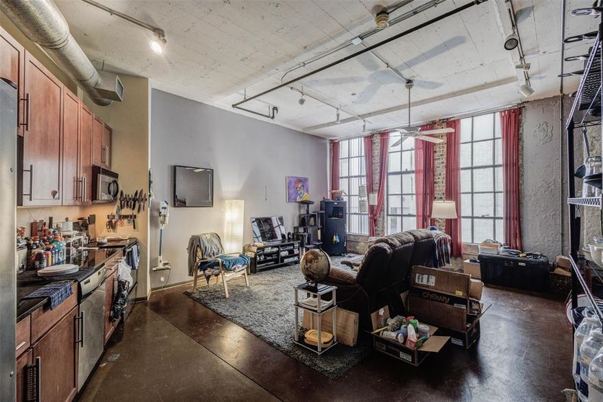 URBAN LOFT LIVING AT ITS BEST!
GREAT INDUSTRIAL STYLE OPEN LOFT CONCEPT WITH CONCRETE FLOORS AND BRICK WALLS IN THE HISTORIC SANTA FE RAILROAD BUILDING IN THE HEART OF DOWNTOWN DALLAS! WALKING DISTANCE TO ENJOY THE CAFES AND SIGHTS OF DOWNTOWN DALLAS!   
LARGE OPEN FLOORPLAN WITH WINDOWS TO ALLOW NATURAL SUNLIGHT! BUILDING OFFERS GREAT AMMENITIES SUCH AS A ROOFTOP POOL, GYM, MEDIA ROOM, CONCIERGE, GATED COVERED PARKING GARAGE WITH ASSIGNED PARKING!  
WATER, TRASH SEWER AND INTERNET INCLUDED IN HOA DUES!
PARKING SPACE IS 177
Loft is Tenant occupied with lease expiration of Midnight July 1, 2026
Agents please adjust Close Date on offers to reflect this date