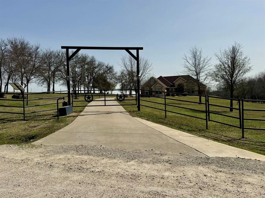 Located toward the end of a quiet cul-de-sac just 2o minutes from McKinney, this 10-acre ranchette is a horse lover’s dream with all the extras for outdoor enthusiasts and modern living. This property features a well-appointed 8-stall barn with a tack room, wash rack, and feed room, plus fenced and cross-fenced pastures ready for your horses.
The outdoor amenities are a fully equipped outdoor kitchen—complete with a built-in grill, side burners, sink, and a fire pit—perfect for entertaining. The RV hanger and workshop offer ample space for recreational vehicles, tools, and projects, with 30 and 50-amp hookups ready to go.
Inside, the home has new wood and tile floors, a new oven and stovetop, and custom built-ins in both the family room and office. Whether you work remotely or just want to stay connected, the on-site internet tower provides strong, reliable coverage to the house, barn, and workshop.
Nestled in a peaceful, private setting, this property offers the ideal balance of luxury living, practical amenities, and the enjoyment of rural life.