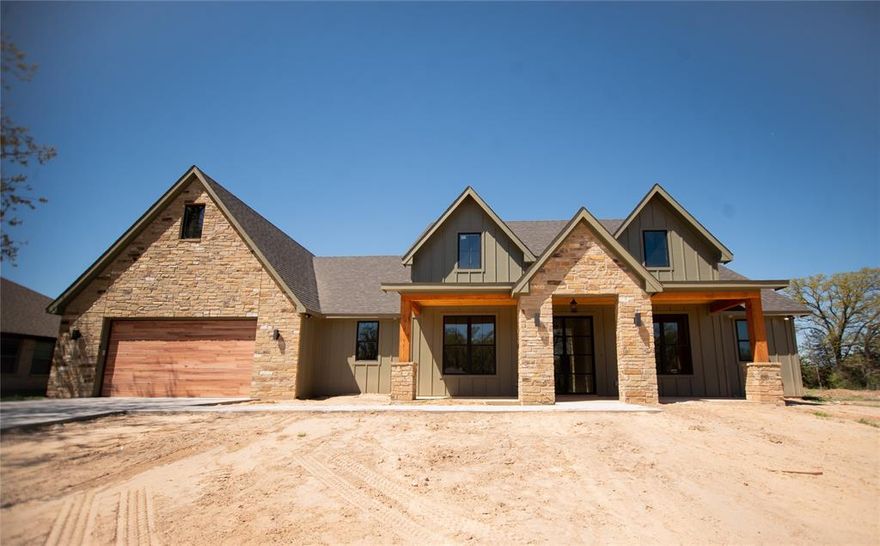 Looking for the perfect blend of country charm and modern luxury, this custom-built house has everything.  4 bedroom 3.5 bath and a large office with floor to ceiling book shelf.