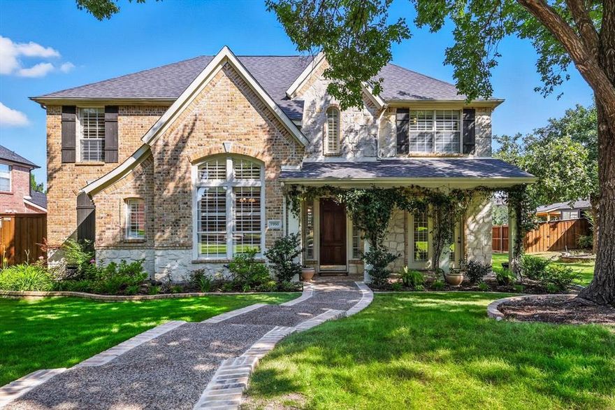 Beautiful Drees cottage-style home with a veranda porch located in peaceful Meadow Hill Estates neighborhood with mature trees & walking distance to schools. Perfect for entertaining, featuring ample indoor & outdoor spaces. Interior has an abundance of windows, providing excellent natural light. Family room boasts a beautiful & cozy fireplace with views of the backyard paradise. Open-concept kitchen is a chef's delight, offering generous countertop space, high-quality red-oak cabinets, a breakfast bar, and a window seat for extra seating. Separate desk provides a dedicated space for meal planning & a charging station. Beautiful high ceilings in foyer & dining room. Study ensures privacy with pocket French doors & direct walk-out access to veranda porch. Large primary bedroom offers serene views of the waterfall pool, tray-ceiling with crown-molding & its ensuite bathroom features a huge walk-in closet, beautiful dimmable double chandeliers, a double vanity with a sit-down area, & separate tub & shower.  Spacious secondary bedrooms have ample walk-in closet space. Game-room includes built-ins & an oversized closet. Well-equipped laundry room with upper cabinets, a sink & hang-up area. Convenient half-bath for guests. Luxurious carpet feels like memory foam underfoot. Texas-sized covered outdoor living area is ideal for watching TV & barbecuing your favorite meals, complemented by extra pool decking for additional entertainment. Heated pool & hot tub with a beautiful waterfall create a tranquil oasis. Outdoor shower with hot water for convenience. 3-car garage provides plenty of covered parking & additional side-yard storage building for pool supplies. Extra storage in walk-out attic, perfect for holiday décor. Its central Frisco location offers a short commute to DNT, Preston Rd, or Hwy 380 & it's close to Warren Sports Complex, FC Dallas Soccer, downtown Frisco, Universal Studios, PGA & variety of parks, restaurants, shopping centers, sports venues & hospitals.