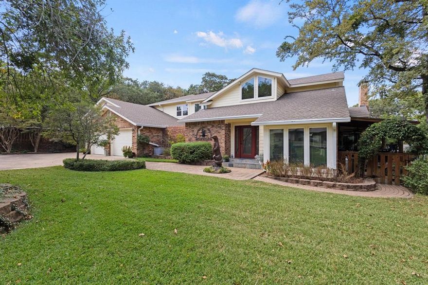 Priced Below Appraised Value!!! Start living with built in equity a beautiful 4,600 square feet home with room to spread out. Five bedrooms and three and a half bathrooms, located inside the Tanglewood Resort sits a home designed for everyday living and entertaining in a serene lifestyle. Tucked away inside the neighborhood clsoest to Lake Texoma delivering space, comfort, making this lake living so special. Over an acre and backing to Corps of Engineers land with direct lake access. The main level opens with connected living, dining, and kitchen spaces where the flow feels natural. Tall shiplap ceilings in the great room adds character. While hardwood floors and terrazzo tile bring style. Two dining areas, two wet bars, and three separate living rooms give you options for gatherings of any size. The open concept keeps everyone connected whether you’re hosting, or relaxing. The home balances generous personal space with areas meant to bring people together. The primary suite is private and spacious, while the additional bedrooms comfortably handle family or guests. Upstairs is a loft style relaxation paradise off the 2nd Primary is a 2nd level deck overlooking the backyard space. A three–car garage plus dedicated boat and RV storage means your vehicles and lake gear are always ready to go. Throughout the home are private entrances as you step outside the lifestyle expands. Four patios create distinct spaces for grilling, lounging, or enjoying the evening breeze. The private swim spa is perfect for health and entertaining. The backyard leads into Corps land right to the lake. Life here is more than what’s inside the walls. Tanglewood Resort surrounds you with amenities that make every day feel like a getaway. Play a round on the championship golf course, enjoy dinner at the resort, relax by the pool, or launch your boat for an afternoon on the lake. This home connects indoor comfort with outdoor freedom, all within a community designed around leisure and connection.