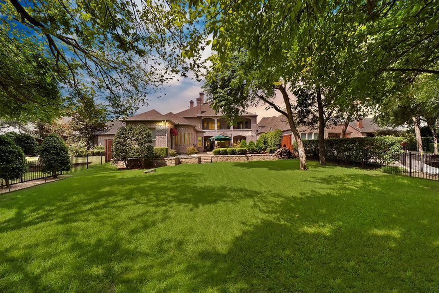 NEWLY RENOVATED in the prestigious gated Stonebriar Park, this stunning estate blends timeless elegance with modern luxury. Set on a serene creek lot, it offers breathtaking views, a resort-style pool, and an expansive backyard oasis. Inside, sophistication meets comfort with soaring ceilings, rich hardwoods, and designer finishes throughout. Extensively remodeled, upgrades include: new kitchen with marble counter tops, three renovated baths (including primary), new hardwood floors throughout the house, carpet upstairs, fresh interior paint throughout the house and so much more! Chef’s kitchen features Viking appliances, a built-in refrigerator, and a 48-inch range, flowing seamlessly into the breakfast nook and family room overlooking the pool. Entertaining is effortless with a private media room, two wet bars, and multiple balconies for indoor-outdoor living. The primary suite is a private retreat with a spa-inspired bath, marble countertops, jetted soaking tub, and a versatile fitness room or expanded closet. Upstairs, spacious secondary bedrooms include a dramatic turret suite with dome ceiling, chandelier, and private balcony. Additional highlights: triple crown molding, 8-foot solid doors, dual staircases, walk-in attic storage, breath taking backyard oasis. Located within award-winning Frisco ISD and just minutes from The Star, Legacy West and Stonebiair country club. This extraordinary estate embodies refined luxury and timeless elegance.