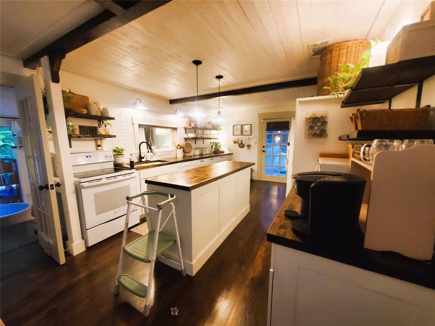 Beautiful fully renovated in 2021 is this classy cottage style 2br 1ba home in Westwood Beach Lake Community. The sellers have poured their heart & soul into making this home so Exceptional!!! It isn’t staged…it's the owner’s decorating skills. She packed a ton of beautiful storage into the decorating. The interior has shiplap walls & ceilings, real wood beams & beautiful wood look laminate flooring throughout with all custom finishes. The home has a 65in smart TV that conveys. This home is perfect for an Airbnb which is allowed by the POA. Located on Cedar Creek Lake, it has lake access so bring your boat. This home has a huge living, den and brick WBFP, flex sunroom and a utility room that's currently a playroom but could easily be a made into a 3rd bedroom or 2nd living area. The kitchen is wonderful huge bar island. There are newer energy efficient windows in the 2 front bedrooms & bathroom. There are 3 outside doors with 3 porches. The home has a Wyze security system with 4cameras(including a doorbell), Front, back, side, & inside cameras. They work together on your phone & will record 2 days worth of footage. There's an optional monitoring service that Wyze offers, it’s about $12 a month. It will instantly call the police if the alarms are triggered. There’s also window & door sensors. They will send a notification when a door or window is opened. Finally, there is a keypad by the entry for alarming when leaving. The Outside living is phenomenal with a wonderful fully furnished concrete patio for outside living & entertaining as well as a separate fire pit area patio chairs. There’s a garden area, raised beds, garden shed, chicken coup. Yes, you can have chickens! Two storage buildings & all sitting on 3 treed lots. The POA is voluntary but only $80 a year for access to the boat launch & sandy beach swim area. The seller is offering a one year home warranty. Only site built homes, no mobile homes.