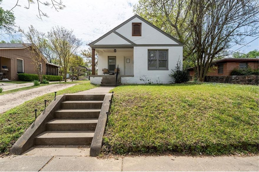 Timeless 1930s Charm in the Heart of Tyler, Step back in time and into comfort at 818 W Rusk Street, a stunning 1939 built cottage that perfectly captures the historic soul of Tyler, Texas. This 3 bedroom, 1 bathroom gem offers the rare blend of vintage character and the serene, established landscape that only decades of growth can provide. There remains a functional historic gas lamp that illuminates the backyard. As you arrive, you’re greeted by a symphony of specimen trees that offer beauty in every season: A towering old oak tree anchors the property, providing deep shade and a sense of permanence, Japanese Maples, classic Dogwoods, and blooming Crape Myrtles create a private, picturesque backdrop for your morning coffee or evening wind-down. Whether you’re enjoying the breeze on the oversized front porch or watching the children play the expansive backyard, this home was designed for outdoor living. The home retains the cozy, storybook feel of the late30s. Every corner radiates warmth, from the natural light pouring through original rope pully style windows to the thoughtful layout. Flexible spaces that can easily serve as a home office or creative studio. The location is nestled in the 75701 zip code, you’re minutes away from Tyler’s vibrant downtown, local boutiques, and the historic Azalea District. Homes with this level of established landscaping and historic integrity are a rare find in the current market. It’s not just a house; it’s a piece of Tyler history.