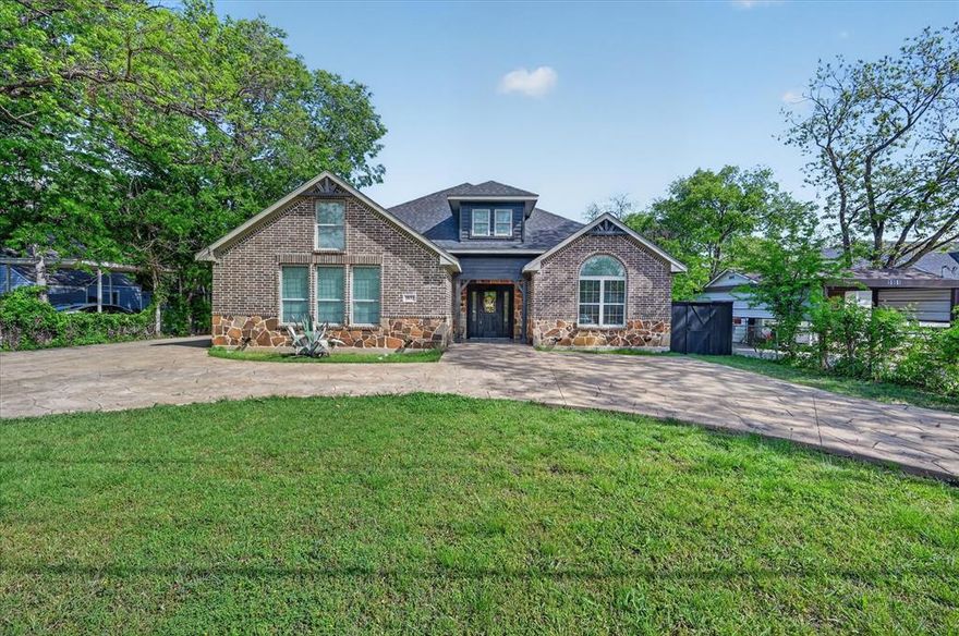 Welcome to this beautifully maintained single-story home situated on a spacious half-acre lot in the Golden Gardens Addition of Haltom City. Offering 3 bedrooms, 2 bathrooms, a designated home office, and 2500 plus square feet of living space. This home combines comfort, functionality, and exceptional outdoor living. Step inside an open-concept layout featuring tile flooring throughout the main living areas, recessed lighting, and a seamless flow between the living room, dining area, and kitchen-perfect for everyday living and entertaining. The kitchen features ample cabinet space, granite countertops, a center island, and a breakfast bar overlooking the main living space. The primary suite is thoughtfully positioned away from the secondary bedrooms and features a spacious layout, dual vanities, and a walk-in closet. A bonus feature of this home is the converted attic,  providing additional usable space ideal for a game room, guest bedroom, or flex space. Step outside to an inviting backyard designed for entertaining. The extended covered patio features stamped concrete, recessed lighting, and a ceiling fan, offering a comfortable, versatile outdoor living space ideal for year-round gatherings. The extended driveway leads to an additional detached carport, allowing for up to two covered parking spaces in addition to the attached two-car garage. Conveniently located just minutes from Downtown Fort Worth and the Fort Worth Stockyards, this home offers easy access to dining, entertainment, and major highways, all within the highly regarded Birdville ISD.
