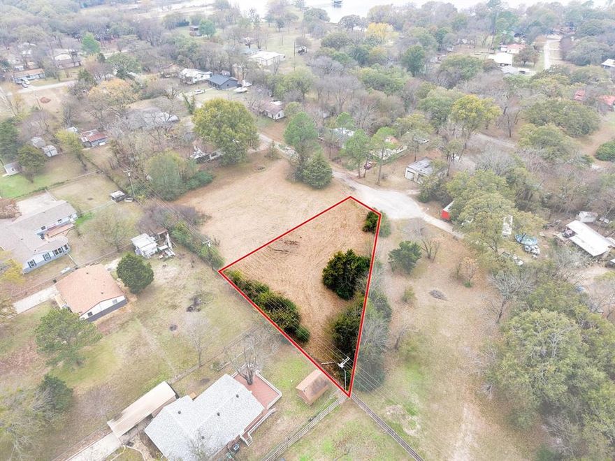 Nestled on a quiet cul-de-sac in the Whispering Oaks community on Lake Tawakoni, this lot offers an ideal setting for peaceful lake living. The property is within a quarter of a mile of the community park and boat ramp on Lake Tawakoni, making it ideal for easy access to fishing and boating or a quick walk to the park.  Located approximately 1 hour and 15 minutes east of Dallas, this area offers peaceful lake living with convenient access to the city. See MLS 21115933 for the opportunity to purchase all three lots, offering a combined total of 0.98 acres.