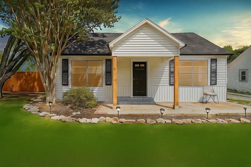 Welcome to this charming 1937 cottage, where timeless elegance meets modern comfort. Nestled beneath mature trees, this storybook home invites you in with its beautiful curb appeal, cozy front porch, and extended patio—perfect for morning coffee or evening gatherings.

Inside, you’ll find original hardwood floors, classic crown molding, and wainscoting that showcase the home’s historic character, seamlessly paired with thoughtful updates. The family room centers around a brick wood-burning fireplace, creating a warm and inviting atmosphere, while the open-concept layout flows naturally from the living area to the dining space and kitchen.

The kitchen, straight out of a cottage magazine, features crisp white cabinetry with glass fronts, a gas range, and a peninsula with counter seating—ideal for casual dining or entertaining. A sliding barn door adds a touch of farmhouse charm, leading to the laundry room.

The primary bedroom offers comfort and relaxation, while two additional bedrooms complete the thoughtful split layout. Situated on a generous 0.34-acre lot, the property provides privacy, shade, and plenty of room to enjoy the outdoors. With a shared driveway, lush surroundings, and a perfect blend of functionality and character, this home is a truly enchanting retreat that combines the best of vintage charm and modern living.