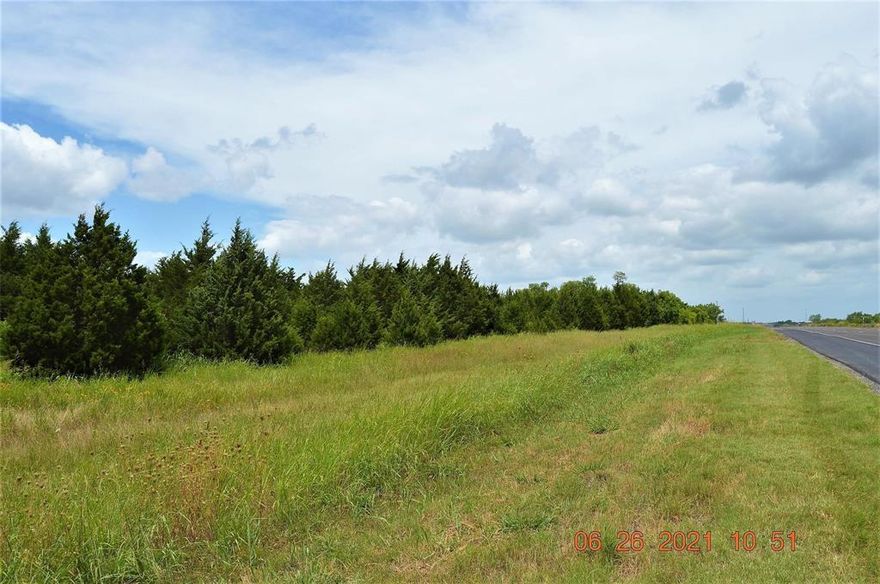 27.141 acres undeveloped property close to Greenville. Inside GEUS service area. Property could be used for a multitude of purposes. Heavily Treed. Road frontage on 2 sides.