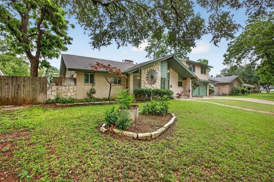 Welcome to this charming home with a mid century flair! This home is unique in all the best ways! Set in a quiet neighborhood with the most amazing neighbors! Open floor plan with great windows invite you in! You will discover so many features.  Tile wood look  floors in the huge living room! The open layout has an amazing window to enjoy the backyard view! Fireplace, built-ins and french doors to the backyard.  Open to the kitchen there is a breakfast bar and space for a dining area. The kitchen has retro glass cabinets but is updated with a double ovens,  granite counter tops, a walk-in pantry and the family chef will love the Jennair 4 burner gas cooktop with an indoor grill.  Downstairs there is primary suite with an ensuite bath and door to the pool area.  Secondary bedroom with built-ins and nice windows.  Additional updated bath downstairs.   Upstairs is a huge primary bedroom, gameroom, inlaw or teen suite.  Beautiful updated bath with a large walk-in shower.  The backyard will be your summer spot! Inground diving pool with large deck area, open patio for bbq's and still room for fun and play. Enclosed patio will be the place for your outdoor entertaining. Convenient location is close to everything!