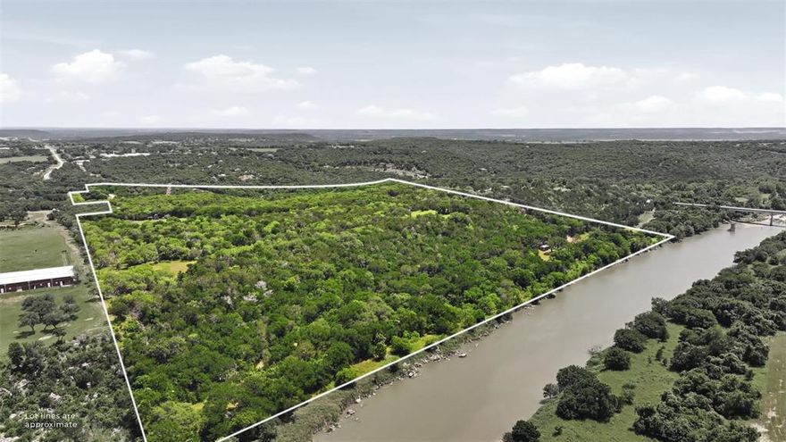 An incredibly rare opportunity to own premier Brazos River frontage in beautiful Palo Pinto County. This remarkable 54-acre property features approximately 1,500 feet of deep-water river frontage, offering breathtaking views, abundant wildlife, and endless recreational opportunities. Nestled in a peaceful country setting just 10 minutes from town and less than an hour from Fort Worth, this property perfectly combines privacy and convenience.

The property includes a well-maintained 2021 model 2-bedroom, 2-bathroom home with covered parking, surrounded by mature trees and lush green grass that create an ideal habitat for wildlife. Current owners regularly enjoy sightings of bald eagles, bobcats, turkey, hogs, and deer, along with exceptional fishing opportunities in the Brazos River.

Whether you are searching for a private weekend retreat, an income-producing short-term rental, or a full-time riverfront residence, this one-of-a-kind property offers endless potential. A brand-new asphalt road provides easy access to the top of the property, and a recorded easement grants access to the river. A new survey is currently being completed.

The property includes a 1989 manufactured home that is in need of significant renovation and may be best suited for removal. A riverside cabin is also located on the property and offers electrical service, presenting great potential for restoration or a weekend retreat. The cabin previously operated with a permit to draw water from the Brazos River. Pics available upon request.