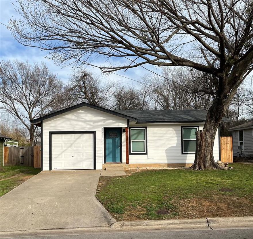 Charming freshly renovated 2 bedroom, 1 bath home. Perfect for first time buyers, small families or student housing. Located conveniently close to UNT and TWU. This home offers plenty of room with a one car garage, concrete driveway and a large lot. Recent upgrades include new windows, a new roof, a fully updated bathroom and new laminate floors. A move in ready home with all appliances, including refrigerator, washer, dryer and 3 window AC units included. With fresh paint inside and out and warm cedar accents, this home is ready for a new family. The large fenced backyard offers security and privacy, while the large patio offers plenty of space for relaxing outside. Don't delay, schedule a viewing soon!!!