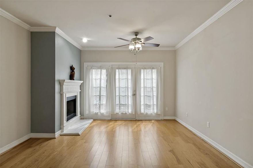 Welcome to The Wyndemere at Turtle Creek, a boutique mid-rise community with 115 residences in one of Dallas’ most desirable neighborhoods. 
This well-maintained one-bedroom, second-floor unit offers effortless, low-maintenance living in the heart of it all. Step inside to a bright and open combined living and dining area, anchored by a cozy fireplace. The galley kitchen sits just off the main living space near the entry way, along with a coat closet, pantry and additional storage. A Juliet balcony overlooks the beautifully updated courtyard, complete with a resort-style pool, spa, BBQ grills, and fresh landscaping, creating a quiet and private oasis in the city. The bedroom is generously sized, and the unit includes a full-size washer and dryer for everyday convenience. Enjoy the ease of gated, underground assigned parking with elevator access and bike storage. Residents of The Wyndemere enjoy 24-hour concierge service, on-site management, security, a fitness center, and a clubhouse perfect for entertaining or relaxing. HOA includes high speed internet, spectrum Tv and multiple streaming services at an exceptionally reduced rate. Located just steps from the Katy Trail, Turtle Creek Park, and the vibrant dining and nightlife of Oak Lawn and Uptown, this home boasts a Walk Score of 92, making it a true urban retreat where everything you need is right outside your door.
