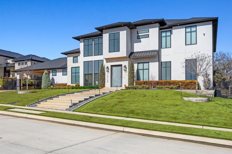 Exquisite modern masterpiece offering approx. 5,800 SF of refined living on a rare .7-acre private lot in a prime Keller location— with easy access to the highly sought after amenities of Westlake, Southlake, Keller, and a 20-minute commute to DFW Airport's North entrance. This recently constructed, custom-designed residence delivers architectural elegance, privacy, and resort-style living that features 5 bedrooms, 6 baths, soaring ceilings, open concept living space, and a first floor dedicated media room. Clean contemporary lines, high ceilings, and sliding walls of glass fill the home with natural light. Premium features include electric shades, surround sound throughout, and seamless indoor-outdoor flow. Enjoy a private backyard retreat with a heated Claffey pool and spa, mature trees, and exceptional privacy behind a gated entrance—ideal for entertaining or everyday relaxation.