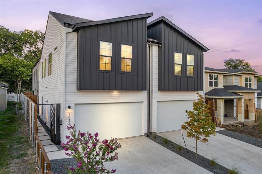 Discover modern living in this beautifully designed single-family attached built by Conrad Homes. The open-concept layout features soaring two-story ceilings and a sleek fireplace, creating an inviting space for entertaining. The chef-inspired kitchen is outfitted with stainless steel appliances, a walk-in pantry, stained wood cabinetry, and an oversized waterfall island perfect for gathering. Upstairs, you’ll find two generously sized guest bedrooms with a shared Jack-and-Jill bathroom, a full-size utility room, and abundant natural light throughout. The spacious primary suite offers a spa-like retreat with a soaking tub, walk-in shower, and an expansive walk-in closet. Enjoy a low-maintenance lifestyle with a private backyard enclosed by an 8-foot board-on-board fence and a covered patio, ideal for relaxing or entertaining. Located in the rapidly developing Mount Auburn neighborhood just minutes from Downtown Dallas and White Rock Lake, this home offers the ultimate in convenience and style—perfect for those seeking a lock-and-leave lifestyle.