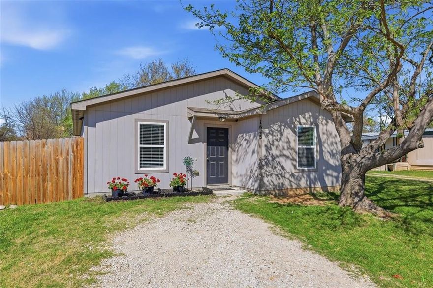 Welcome to this lovely 3 bed 2 bath ONE OWNER home in the Azle ISD. Situated on a spacious lot with plenty of privacy from a 6ft wood fence enclosing the entire back yard. Flooring throught the entire house has been updated. Carpet installed in the bedrooms March 2026. Vinyl Installed in the bathrooms March 2026. Vinyl Plank flooring throught the rest of the home installed Janurary 2025. Open concept layout for the main living areas. With all bedrooms on the right side of the home. There are two storage buildings in the back. One of those is temperature controlled. On the back side of that building there is a partially screened patio. All appliances to convey in the sale of the home. Home is minutes away from Eagle Mountain Lake with Pelican Bay Boat ramp just down the street for easy Lake access. Look no further, this home is ready for its next owner. Is that you?