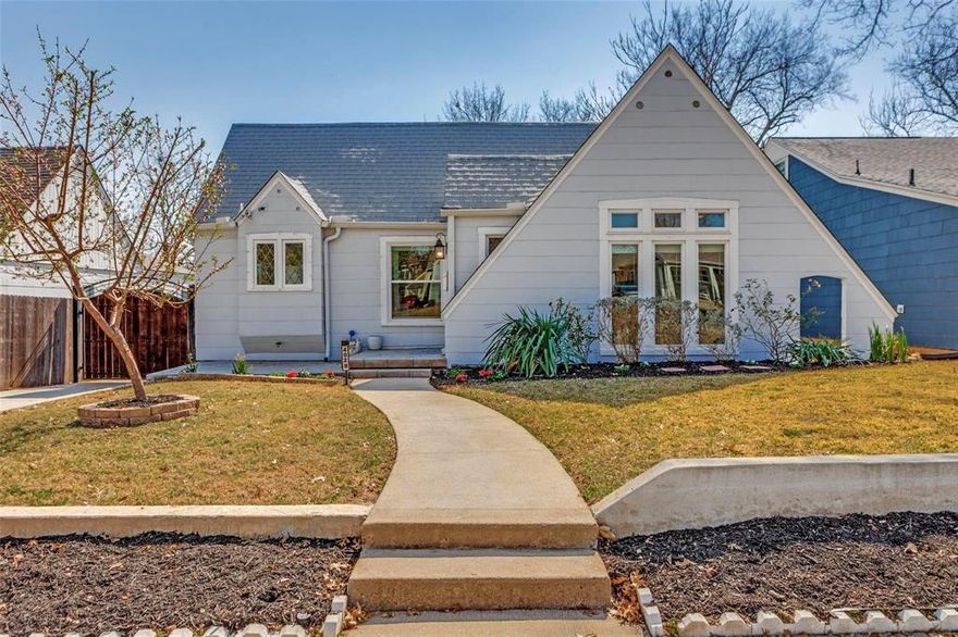 Adorable bungalow in the heart of Fort Worth's Historic Arlington Heights. This home offers Fort Worth charm with extensive crown molding and trim work throughout with beautiful original hardwood flooring! Inside this light and bright single-story you will find two bedrooms with two full baths, spacious family room with cozy fireplace, and a detached single-car garage that provides ample storage space if you prefer! A formal dining is perfectly situated between the kitchen and living areas, ideal for entertaining. Beautifully updated kitchen with eat-in area boasts an abundance of cabinetry and counter space, stainless appliances including a new gas range in 2021, new dishwasher in 2024, and new microwave in 2025. Primary suite offers a luxurious ensuite bath with a glass enclosed shower. Private backyard is complete with an expansive covered deck and extended patio area. Full sprinkler system installed 2023! Terrific location just minutes from major highways, Dickies Arena and the Botanic Garden, and endless dining and entertainment options!