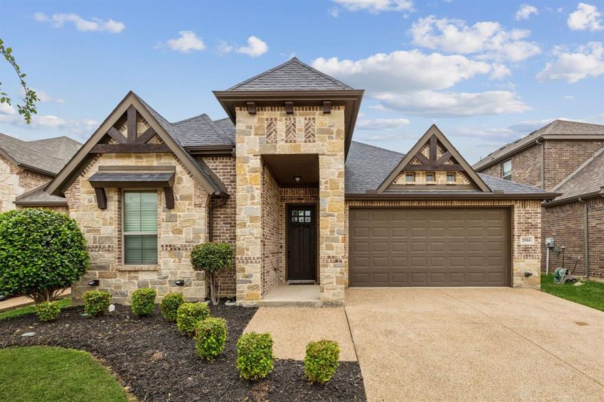 Welcome to luxury living in the exclusive, gated enclave of Knott’s Landing, featuring only 32 custom homes for an intimate and private community experience. Located on a cul-de-sac, this John Houston Custom Home offers a truly impressive and thoughtfully designed floor plan that combines elegance, and functionality. From the moment you enter, you’ll be captivated by the wide-open layout and warm wood flooring that flows seamlessly through the entry, kitchen, dining, and family room. The heart of the home features a spacious living area with a beautiful fireplace and large windows that invite in natural light. The kitchen boasts granite countertops, custom cabinetry, and modern appliances – perfect for everyday living and entertaining. The oversized primary suite is a true retreat, complete with a spa-inspired en-suite bathroom with a generous walk-in closet, separate shower, and dual vanities. Upstairs, you'll find a large game room with an attached full bathroom, making it ideal for a private fourth bedroom! Attached is a media room, equipped with a projector screen and multiple TVs for the ultimate cinematic experience. Step outside to your own private sanctuary – the extended covered patio features an outdoor fireplace and ample space for relaxing. Whether you're hosting guests or enjoying a quiet evening under the stars, this exceptional outdoor living area is designed for year-round enjoyment. This custom-built masterpiece blends comfort, style, and sophistication in a serene, gated setting. With high-end finishes throughout and thoughtful design touches, this home is truly one-of-a-kind. Centrally located between Dallas and Ft. Worth. Easy access to two major highways. Near Globe Life, Cowboys Stadium, Six Flags, Hurricane Harbor, and Texas Live. Close to fine dining. Highly acclaimed Martin high school. Furniture is negotiable, including all media furniture and equipment, and game tables.